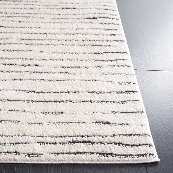 Safavieh Melody 118 Modern Power Loomed Rug Ivory / Black MEL118A-9