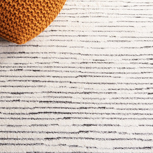 Safavieh Melody 118 Modern Power Loomed Rug Ivory / Black MEL118A-9