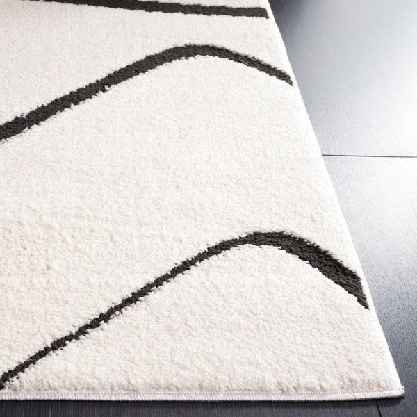 Safavieh Melody 120 Modern Power Loomed Rug Ivory / Black MEL120A-9