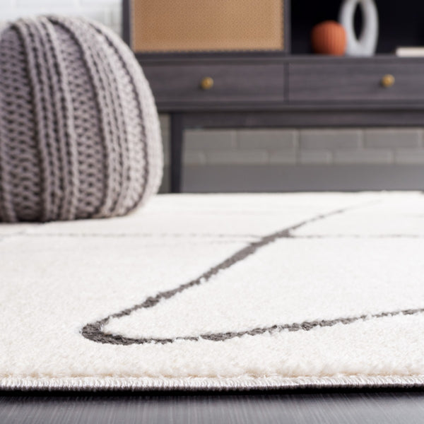 Safavieh Melody 120 Modern Power Loomed Rug Ivory / Black MEL120A-9