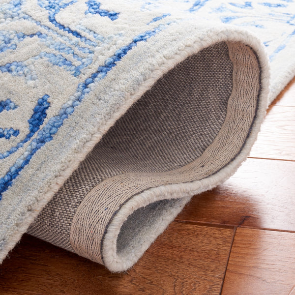 Safavieh Metro 255 Hand Tufted Pile Content: 100% Wool Rug Blue / Beige Pile Content: 100% Wool MET255M-5