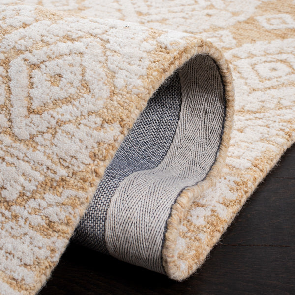 Safavieh Metro 987 Hand Tufted 100% Fine Indian Wool Pile Rug Gold / Ivory 100% Fine Indian Wool Pile MET987D-4