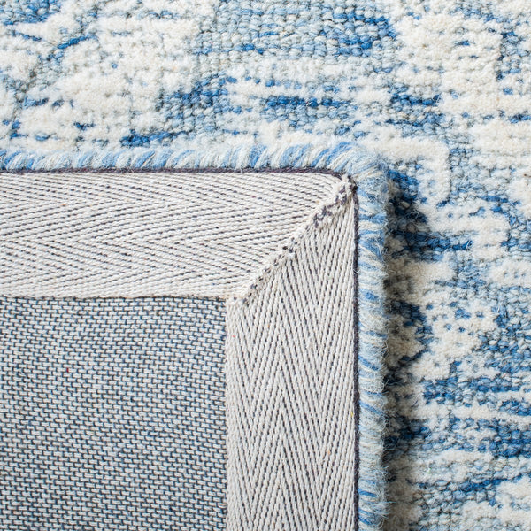 Safavieh Metro 987 Hand Tufted 100% Fine Indian Wool Pile Rug Blue / Ivory 100% Fine Indian Wool Pile MET987M-4