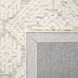 Safavieh Metro 987 Hand Tufted 100% Fine Indian Wool Pile Rug Light Brown / Ivory 100% Fine Indian Wool Pile MET987T-4