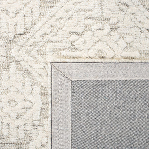 Safavieh Metro 987 Hand Tufted 100% Fine Indian Wool Pile Rug Light Brown / Ivory 100% Fine Indian Wool Pile MET987T-5