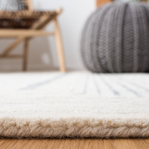 Safavieh Metro 991 Hand Tufted 60% Pet Yarn, 40% Wool Rug Dark Grey / Ivory 60% Pet yarn, 40% Wool MET991H-5