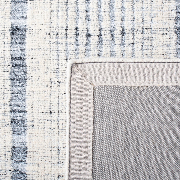 Safavieh Metro 991 Hand Tufted 60% Pet Yarn, 40% Wool Rug Dark Grey / Ivory 60% Pet yarn, 40% Wool MET991H-5