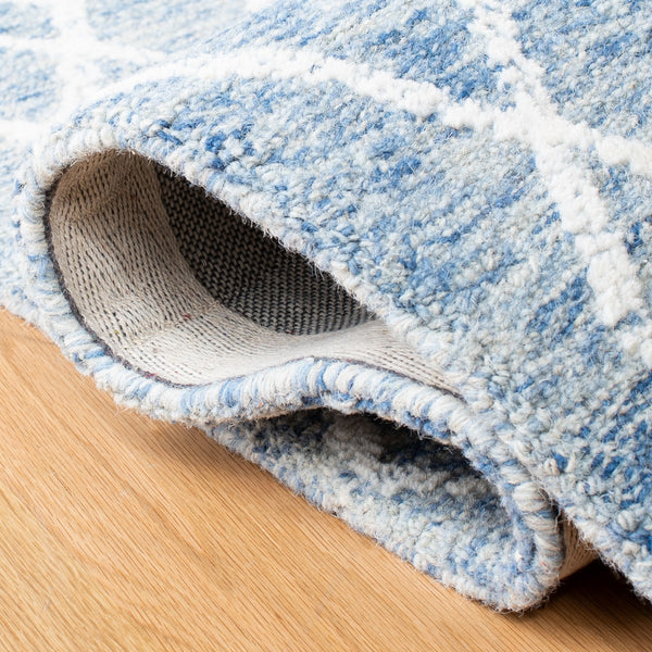 Safavieh Metro 994 Hand Tufted 100% Fine Indian Wool Pile Rug Blue / Ivory 100% Fine Indian Wool Pile MET994M-4