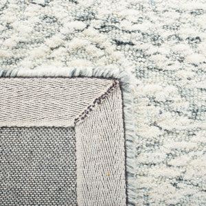 Safavieh Metro 998 Hand Tufted Indian Wool and Cotton with Latex Rug MET998H-9