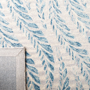 Micro-Loop 170 Contemporary Hand Tufted 80% Wool, 20% Cotton Rug Ivory / Blue