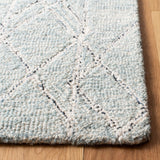 Micro-Loop 172 Solid & Tonal Hand Tufted 80% Wool, 20% Cotton Rug Ivory / Light Blue