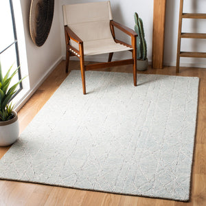 Micro-Loop 172 Solid & Tonal Hand Tufted 80% Wool, 20% Cotton Rug Ivory / Light Blue