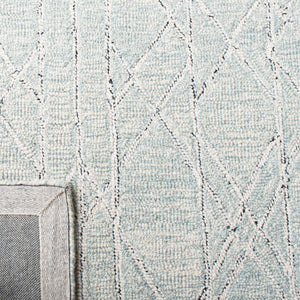 Micro-Loop 172 Solid & Tonal Hand Tufted 80% Wool, 20% Cotton Rug Ivory / Light Blue