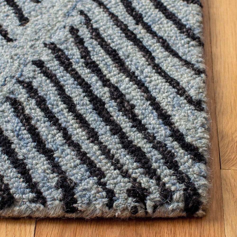 Micro-Loop 179 Contemporary Hand Tufted 80% Wool, 20% Cotton Rug Light Blue / Charcoal