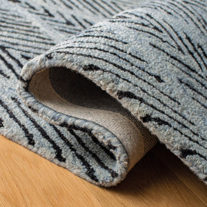Micro-Loop 179 Contemporary Hand Tufted 80% Wool, 20% Cotton Rug Light Blue / Charcoal