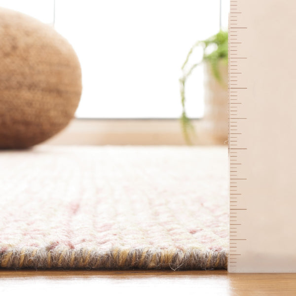 Safavieh Nomad 801 Hand knotted Modern Rug Gold / Rust 9' x 12'