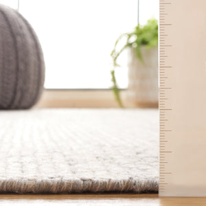 Safavieh Nomad 801 Hand knotted Modern Rug Grey / Ivory 9' x 12'