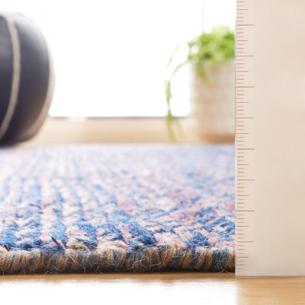 Safavieh Nomad 801 Hand knotted Modern Rug Navy / Pink 9' x 12'