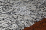 Chandra Rugs Onex 100% Polyester Hand-Woven Contemporary Shag Rug White 9' x 13'