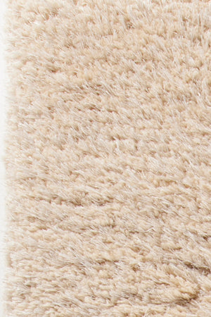 Chandra Rugs Osim 100% Polyester Hand-Tufted Contemporary Shag Rug Beige 9' x 13'