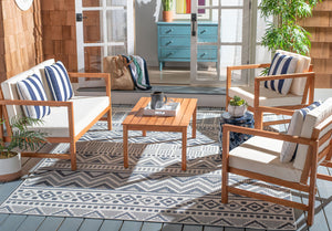 Montez 4-Piece Outdoor Furniture Set with Stylish Accent Pillows for Chic Patio Comfort