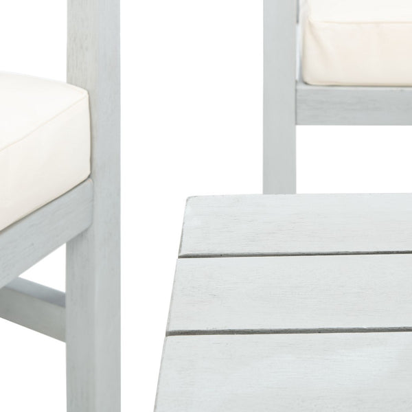 Montez 4-Piece Outdoor Furniture Set with Stylish Accent Pillows for Chic Patio Comfort