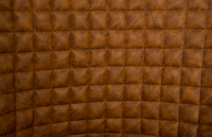 Autumn Chair, Quilted Cognac, Trumpet Swivel Base, Polished Stainless Steel