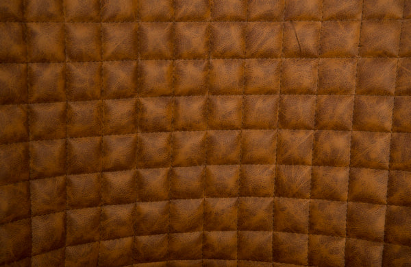 Autumn Chair, Quilted Cognac, Trumpet Swivel Base, Polished Stainless Steel