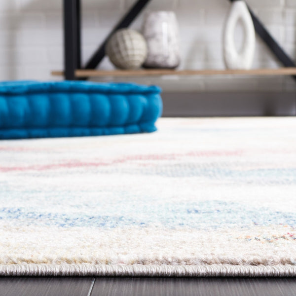 Safavieh Phoenix 551 Contemporary Power Loomed Rug Ivory / Blue Rust PHX551A-9