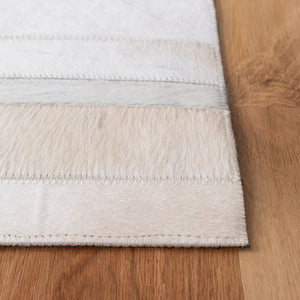 Safavieh Studio Leather 800 Hand Woven 70% Leather and 30% Felted Cloth Natural Hide Rug STL804A-9