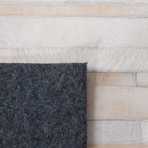 Safavieh Studio Leather 800 Hand Woven 70% Leather and 30% Felted Cloth Natural Hide Rug STL804A-9