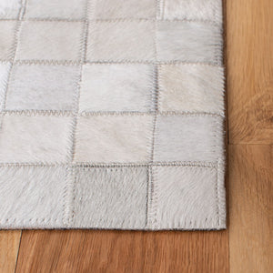 Safavieh Studio Leather 800 Hand Woven 70% Leather and 30% Felted Cloth Natural Hide Rug STL813A-9