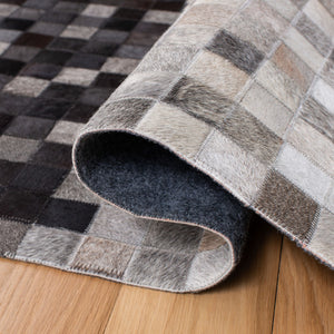 Safavieh Studio Leather 800 Hand Woven 70% Leather and 30% Felted Cloth Natural Hide Rug STL813A-9