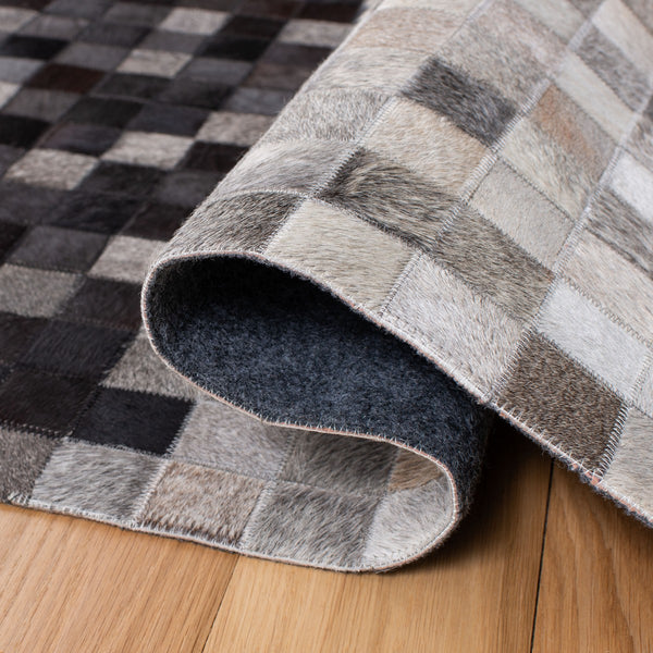 Safavieh Studio Leather 800 Hand Woven 70% Leather and 30% Felted Cloth Natural Hide Rug STL813A-9