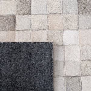 Safavieh Studio Leather 800 Hand Woven 70% Leather and 30% Felted Cloth Natural Hide Rug STL813A-9