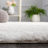 Safavieh Tahoe Shag 677 Power Loomed 60% Polypropylene/Jute 40% Contemporary Rug THO677G-9