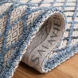 Safavieh Trace 204 Hand Tufted Wool 65%, Viscose, 25%, Nylon 10% Rug Blue / Black 9' x 12'