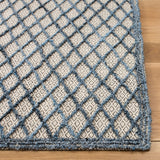 Safavieh Trace 204 Hand Tufted Wool 65%, Viscose, 25%, Nylon 10% Rug Blue / Black 9' x 12'