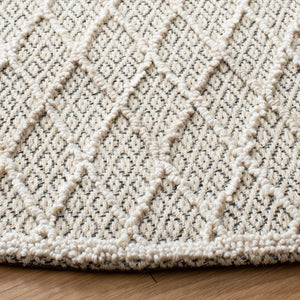Safavieh Trace 209 Hand Tufted Wool 65%, Viscose, 25%, Nylon 10% Rug Ivory / Black 9' x 12'