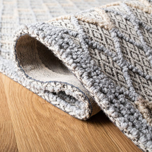 Safavieh Trace 209 Hand Tufted Wool 65%, Viscose, 25%, Nylon 10% Rug Blue / Black 9' x 12'