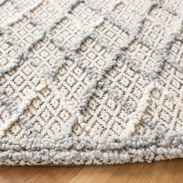 Safavieh Trace 209 Hand Tufted Wool 65%, Viscose, 25%, Nylon 10% Rug Blue / Black 9' x 12'