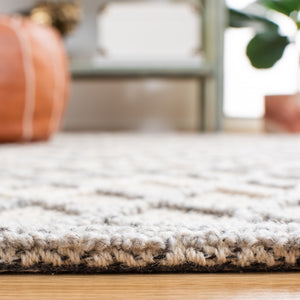 Safavieh Trace 209 Hand Tufted Wool 65%, Viscose, 25%, Nylon 10% Rug Blue / Black 9' x 12'