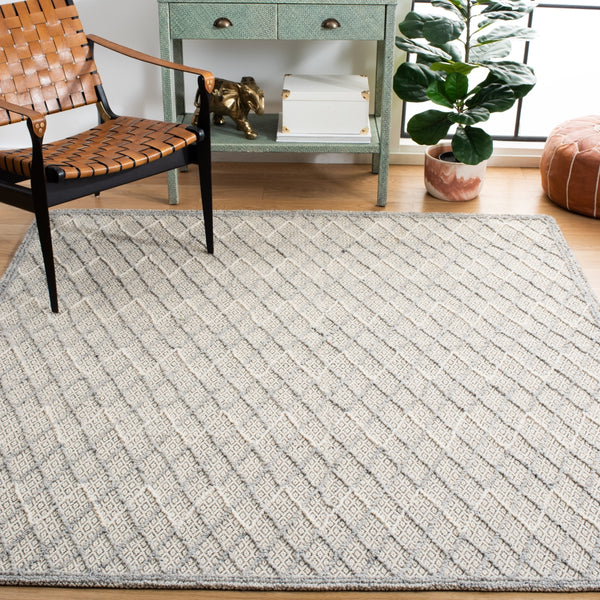 Safavieh Trace 209 Hand Tufted Wool 65%, Viscose, 25%, Nylon 10% Rug Blue / Black 9' x 12'