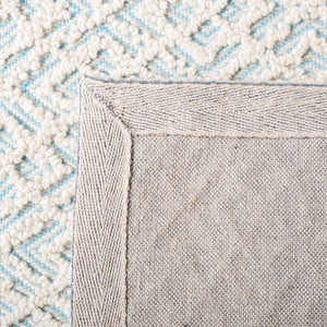 Trace 224 Contemporary Hand Tufted Wool 65%, Viscose, 25%, Nylon 10% Rug Ivory / Blue