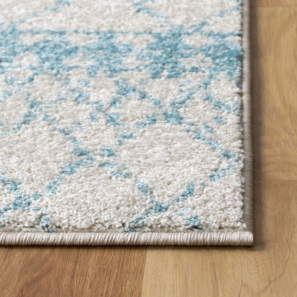 Tulum 229 Bohemian Power Loomed Polypropylene Pile Rug Ivory / Turquoise