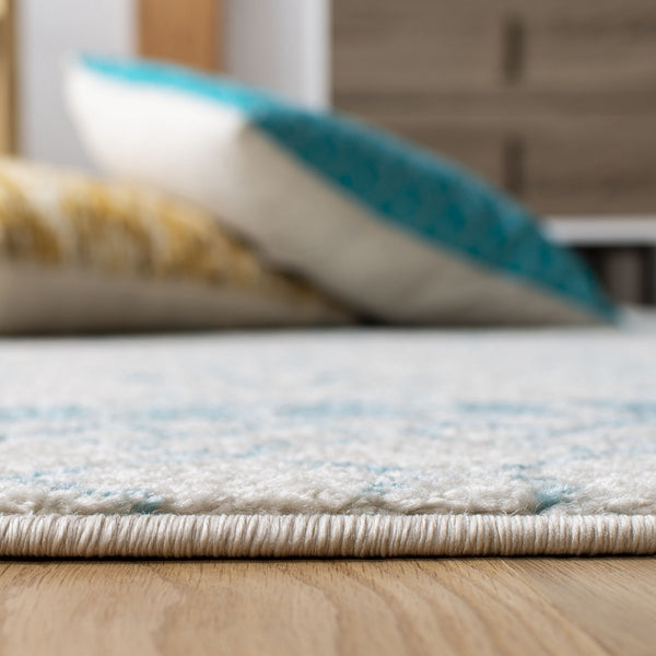 Tulum 229 Bohemian Power Loomed Polypropylene Pile Rug Ivory / Turquoise