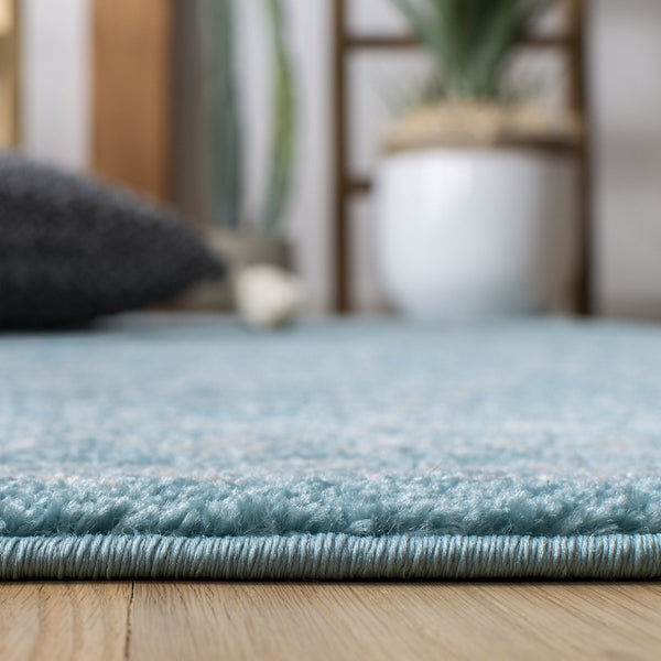 Tulum 267 Bohemian Power Loomed Polypropylene Pile Rug Turquoise / Ivory