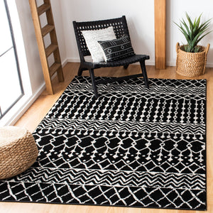 Tulum 270 Bohemian Power Loomed Polypropylene Pile Rug Black / Ivory
