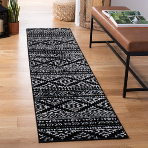 Tulum 272 Bohemian Power Loomed Polypropylene Pile Rug Black / Ivory