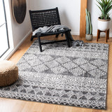 Tunisia 734 Bohemian Power Loomed 100 % Polyproplene Pile Rug Black / Ivory